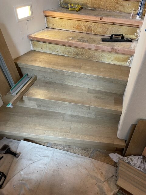 A staircase is being built in a home.